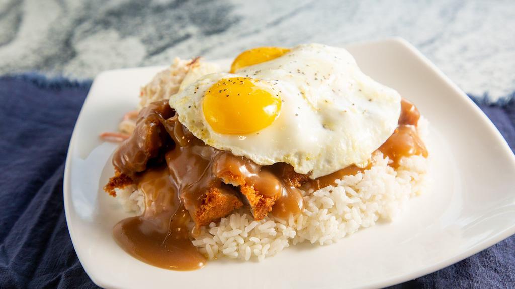 Katsu Loco Plate · Chicken katsu that's smothered in made in house brown gravy, topped with two large eggs, and sautéed onions.