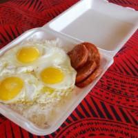 Portuguese Sausage And Eggs · Six slices of grill Portuguese sausage with three large eggs and rice.