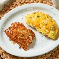 Bacon & Cheese Omelette · Served with hash browns.