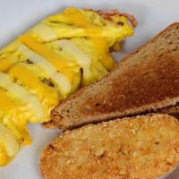 Ham & Cheese Omelette · Served with hash browns.