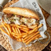 Philly Cheese Steak Hot Panini · Premium sirloin steak thin cut and cooked to order with onion, bell pepper, and melted Provo...