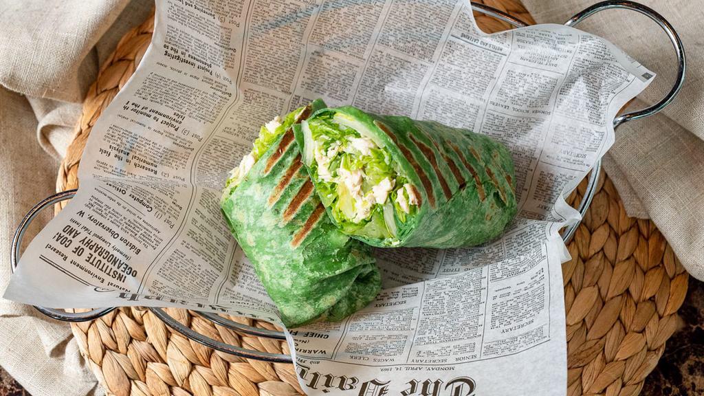 Chicken Caesar Wrap · Grilled chicken, Parmesan cheese, and romaine lettuce tossed with caesar dressing.