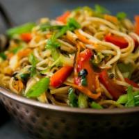 Fired Hakka Noodles · Hakka noodles cooked in Indo Chinese spices along with chosen topping