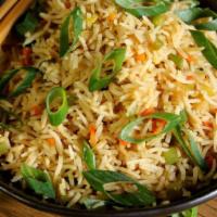 Veg Fried Rice · Rice is stir fried with fresh carrots, beans and spring onions.
