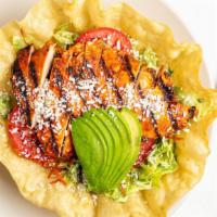 Chicken & Avocado Salad · Marinated grilled chicken breast, romaine lettuce, tomatoes, cotija cheese, pepita seeds, to...