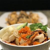 Tom Kah (Bowl) · Lemongrass, mushrooms, onions and Thai spices in coconut broth with your choice of chicken o...
