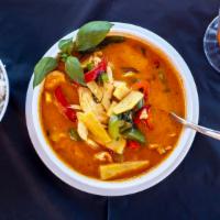 Red Curry · Bamboo shoots, sweet basil, bell peppers and coconut milk.