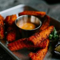 Crispy Salmon Strips · Deep-fried salmon served w/ chipotle mayo
