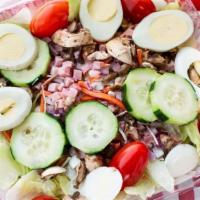 Chef Salad · Romaine lettuce, grape tomatoes, cucumber, carrots, onions, hard-boiled egg, ham, mushrooms,...