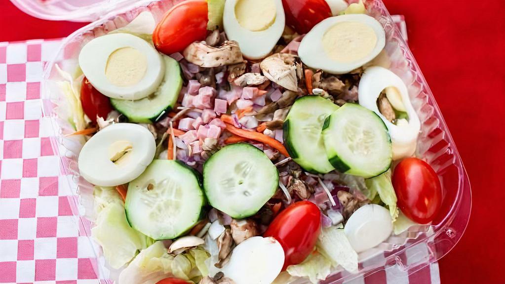 Chef Salad · Romaine lettuce, grape tomatoes, cucumber, carrots, onions, hard-boiled egg, ham, mushrooms, dressing of choice: Ranch, Thousand Island, Blue Cheese, Vinaigrette