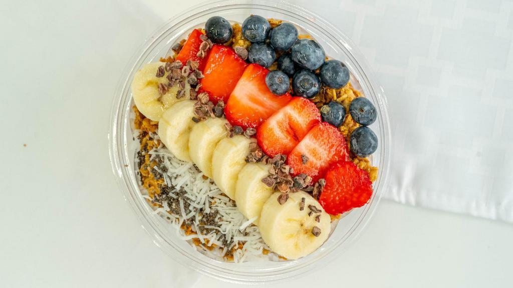 Bloom Bowl · Blended: Acai, Strawberry, Banana, Blueberry, Almond Milk, and Mango.

Topped: Banana, Blueberry, Chia, Strawberry, Cacao Nibs, Granola, Coconut, and Agave.