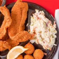 Catfish Plate Dinner · Catfish encrusted in cornmeal with served with your choice of two side dishes, hush puppies,...