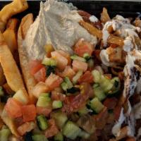 Tlv · Hummus, tahini,  israeli salad  and marinated chicken thigh with grill onions