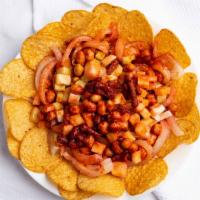 Tostilocos · Tostitos chips on the side, cueritos,  cucumber, jicama, peanuts,  spicy tamarind pieces, ch...