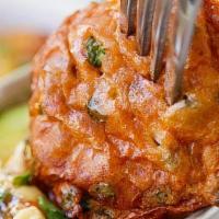 Fish Cakes (5 Pcs) · Deep-fried minced fish, red curry paste, bush beans, galangal and eggs. Served with sweet an...