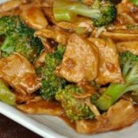 Pad See Ew · Fresh wide rice noodles stir fried with meat, broccoli, egg and Thai sweet black soy sauce.