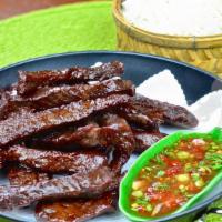 Thai Beef Jerky W/ Sticky Rice · Deep - fried marinated beef serving with sticky rice