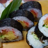 Tokyo Big Roll · Tempura shrimp roll, salmon, albacore tuna on top with spicy snow crab.