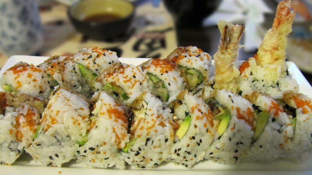 Shrimp Tempura Roll · Shrimp tempura, avocado, tempura flakes and eel sauce.