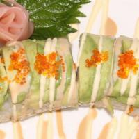 Sunrise Roll · Cucumber, Avocado, Spicy Snow Crab topped with Fresh Salmon, Lemon and White Sesame Seed.