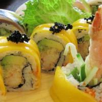 Moschino Roll · Cucumber, Avocado, Spicy Tuna topped with Sliced Avocado, Spicy Mayo, Eel Sauce and Black Se...
