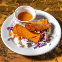 Vegetable Spring Rolls (2) · Cabbage, carrot, green bean, onion, garlic, and ginger wrapped in spring roll skin and fried...