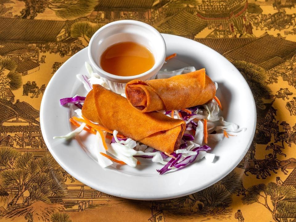 Vegetable Spring Rolls (2) · Cabbage, carrot, green bean, onion, garlic, and ginger wrapped in spring roll skin and fried crispy. Served with plum sauce.