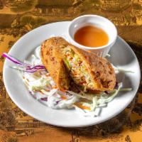 Chinese Egg Roll (1) · Stir-fried cabbage, carrot, celery, and chicken wrapped in wonton skin; battered and deep fr...
