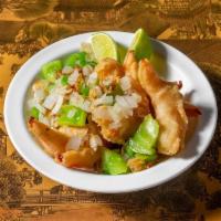 Salt & Pepper · Battered shrimp, fish or tofu tossed with bell peppers, onions, fried garlic, baked salt and...