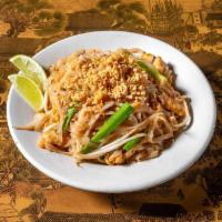 Pad Thai · Fresh rice noodles sauteed with chicken or tofu, egg, scallions, bean sprouts, and ground pe...