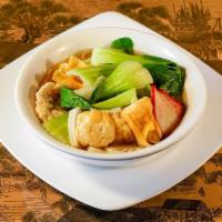 Wonton Noodle Soup · Shrimp wontons, chicken, char-sil pork, bok choy and egg noodles in a savory broth.