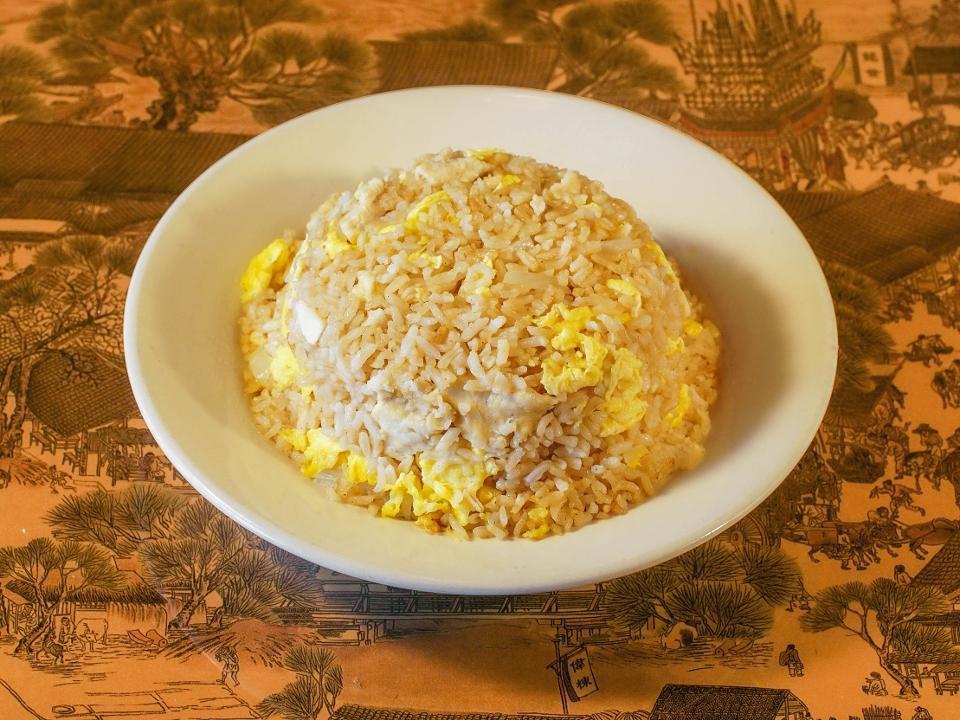 Chicken Fried Rice · Chicken, onions and egg.