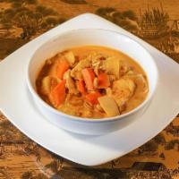 Massaman Curry · Potatoes, carrots, onions, and peanuts simmered with coconut milk in dried red chili, tamari...