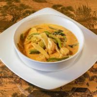 Red Curry · Bamboo, bell peppers, and Thai basil simmered with coconut milk in dried red chili, lemongra...