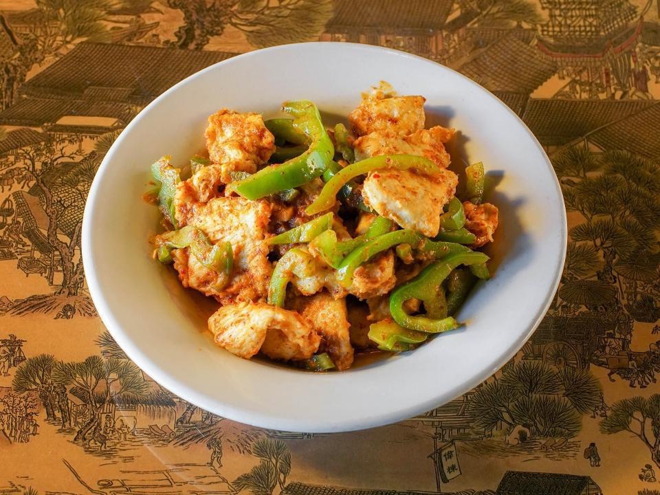 Pad Prik King · Bell peppers and bamboo stir-fried in a sweet red curry paste with kaffir lime leaf.