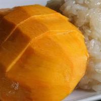 Mango Sticky Rice · Sticky rice flavored with sweet coconut milk and served with fresh mango.