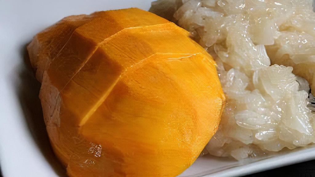 Mango Sticky Rice · Sticky rice flavored with sweet coconut milk and served with fresh mango.