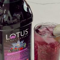 Purple Lotus Energy Drink · Energy drink made from plants! Pick your flavor shots below to make the drink your own!