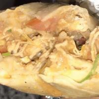 Breakfast Burrito · Scrambled eggs, rice, beans, melted Monterrey Jack cheese, Salsa wrapped in a flour tortilla...