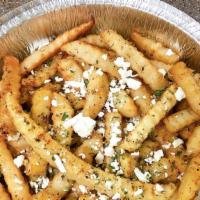 Feta Fries · Mediterranean seasoned fries topped with Feta cheese.