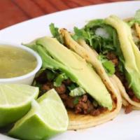 Tacos Campechanos · Orden de tres tacos. 
Carne al pastor y asada, cilantro, cebolla y aguacate.