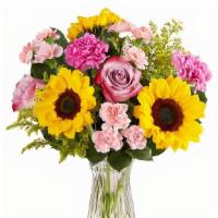 Her Favorite Bouquet  · Sunflowers, roses,  carns and pretty green foliage 


Please let us know what message you ne...