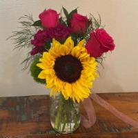 Brighter Day  · Colorfully bold 
Sunflowers, roses and carnations