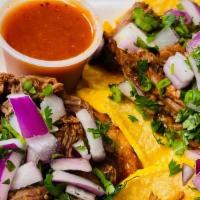 Birria Tacos With Consume( 4 Tacos) · Birria with Corn tortillas. Comes with red onions and Cilantro with Consume (Dipping Sauce)....