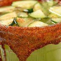 Fresh Cucumber Agua · Fresh Cucumber and Mint and Lime Water sweetened to perfection with chamoy Rim