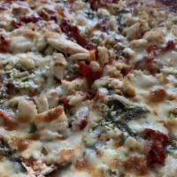 Eva'S · Pizza Sauce, Mozzarella & Feta Cheese's, Chicken, Garlic, Pesto, Spinach, Onions,Sun-Dried T...