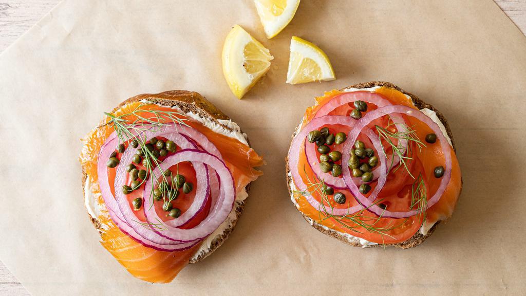Lox Bagel · Served open faced with cream cheese, tomatoes, onion and capers.
