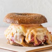 Reuben Sandwich · Hot corned beef with sauerkraut, Swiss cheese and 1000 island dressing.