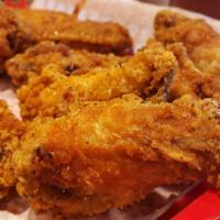 6 Chicken Wings · Our signature fried chicken wings served with flavor of your choice.