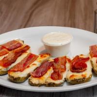 Baked Jalapeño Poppers · Cream cheese, cheddar jack, provolone, bacon, and side of ranch.